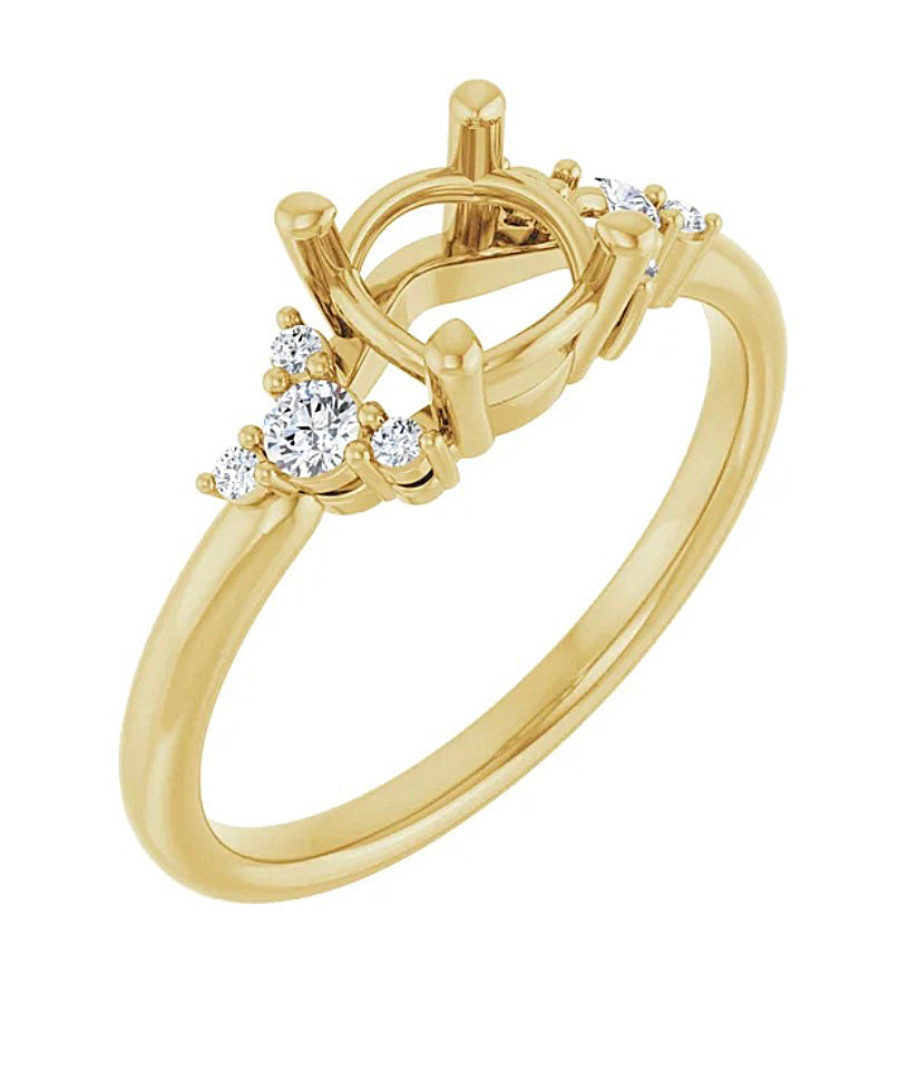 Angled view of a Gold engagement ring semi-mount with diamond accents on a white background