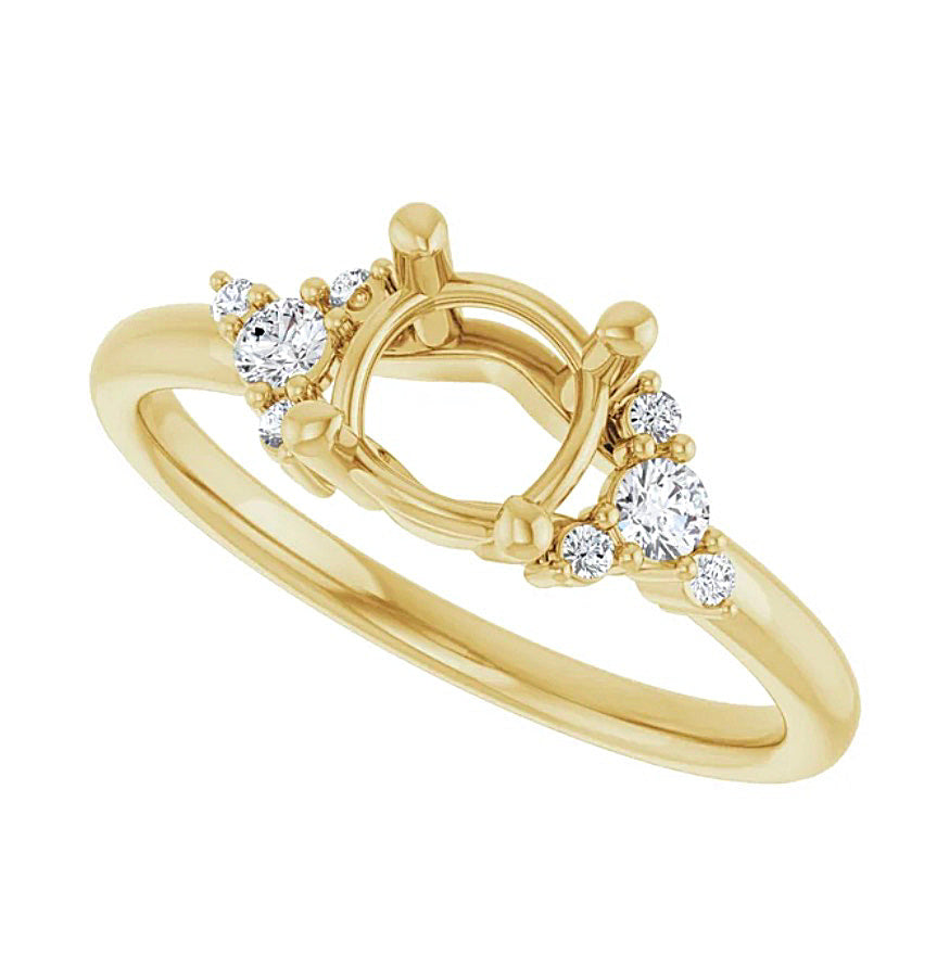 Angled view of a Gold engagement ring semi-mount  with diamond accents on a white background