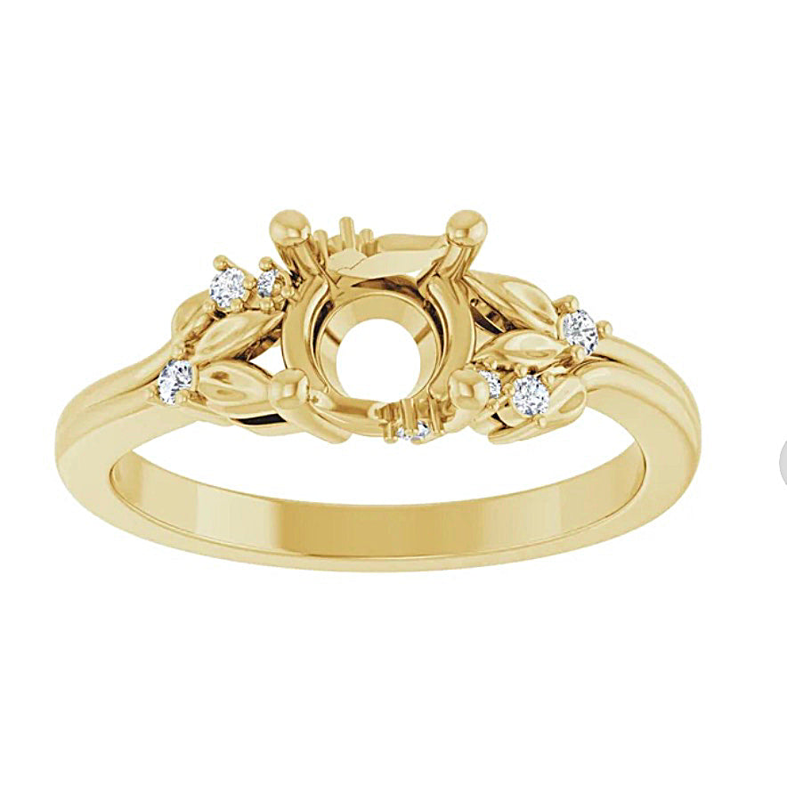 Gold engagement ring semi-mount with diamond accents on a white background