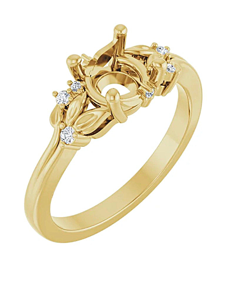 Gold engagement ring semi-mount with decorative design of leaves and small diamonds on a white background