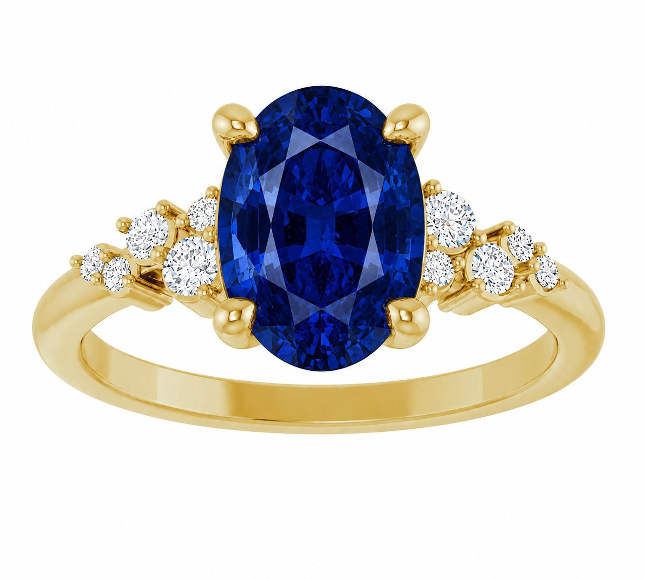 Gold engagement ring with a blue oval cut sapphire gemstone and smaller diamonds on a white background