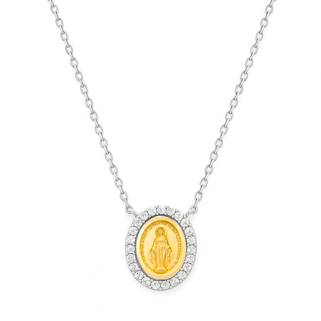 A 14K two tone (white and yellow) gold necklace featuring an oval Miraculous Medal with a diamond halo, on a cable chain on a white background