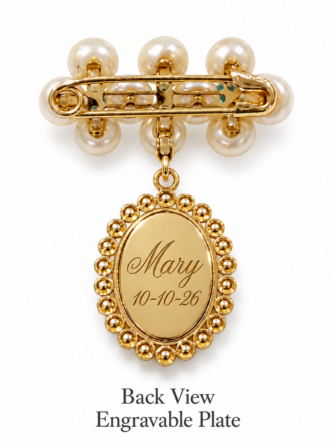 Gold-toned safety pin brooch with pearl-like beads and an oval engraved plate reading 'Mary 10-10-26', shown on a white background with the text 'Back View Engravable Plate' below.