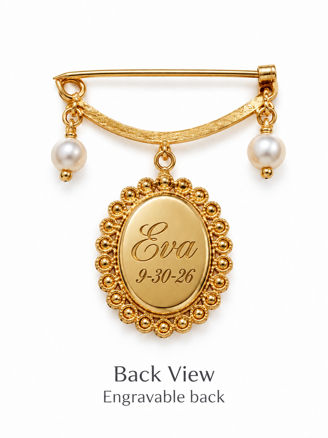 Back View of a Gold keepsake pin with a curved top bar, two dangling pearl beads, and an oval engraved medallion reading 'Eva 9-30-26', shown on a white background with the text 'Back View Engravable back' below.
