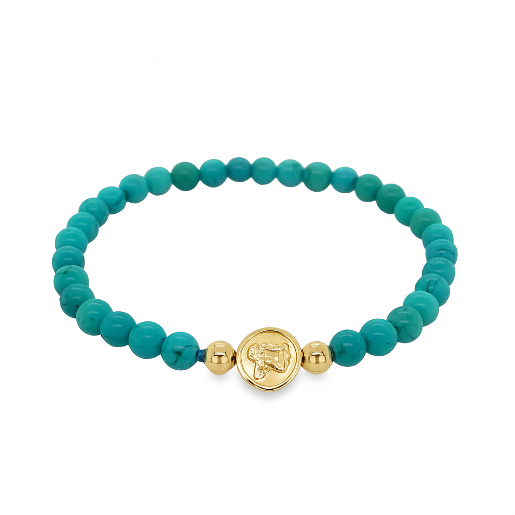 Turquoise beaded bracelet with a gold charm on a white background