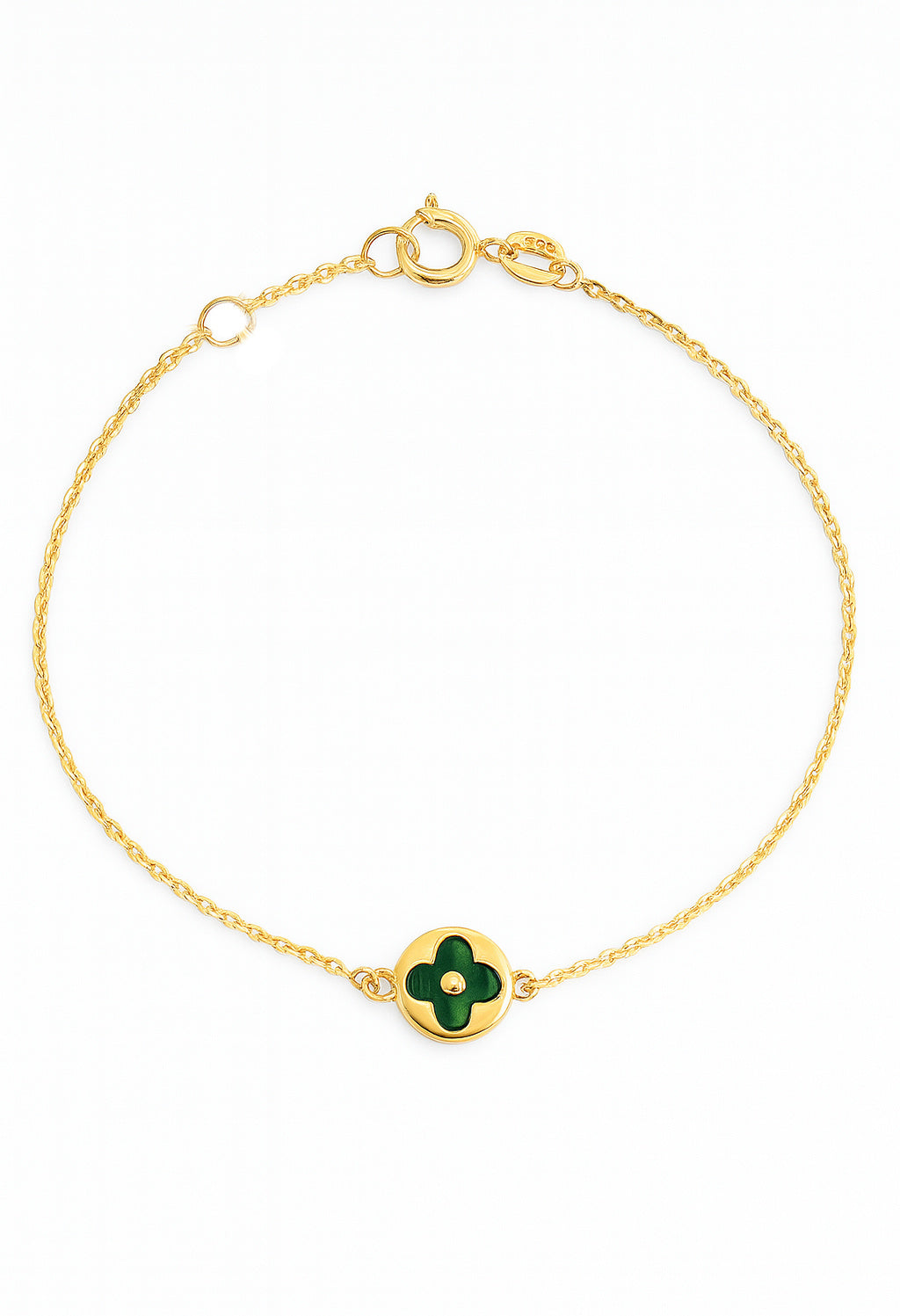 Gold bracelet with a green clover charm on a white background