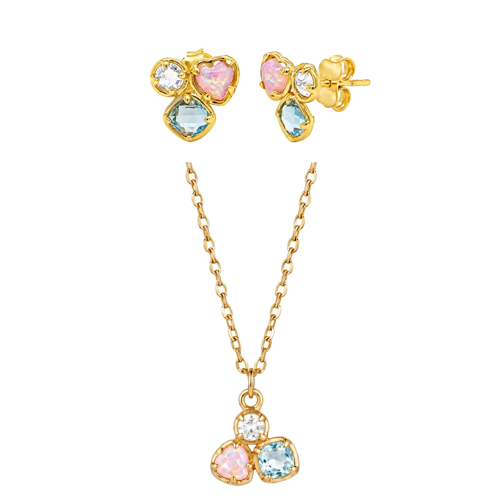 Gold jewelry set with heart-shaped gemstones on a white background