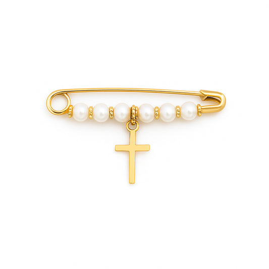 Gold brooch with pearl beads and a cross charm on a white background
