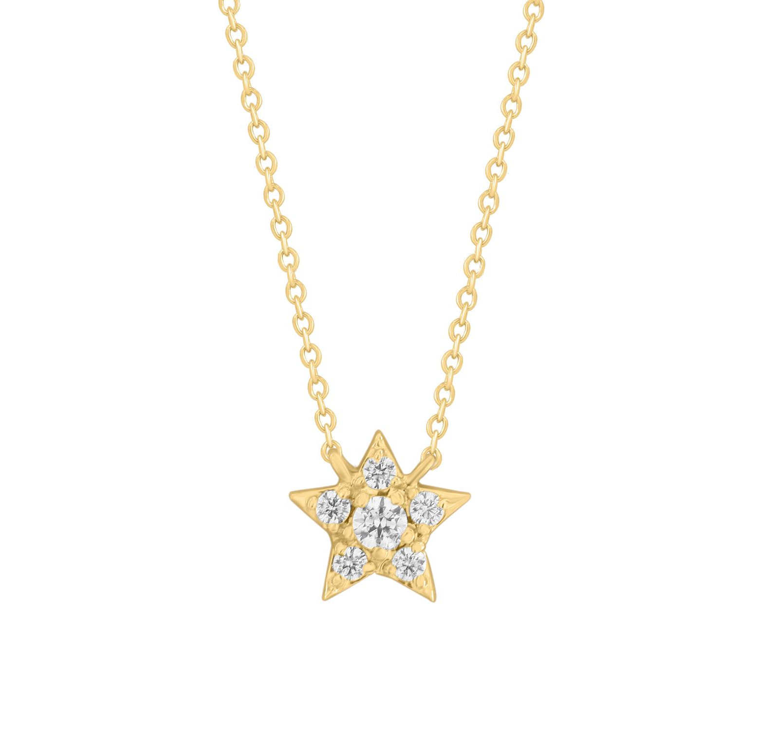 A gold miniature diamond star necklace with a jump ring, featuring a star-shaped design with diamonds set in it.