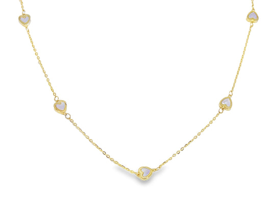 Gold necklace with heart-shaped gemstones on a white background