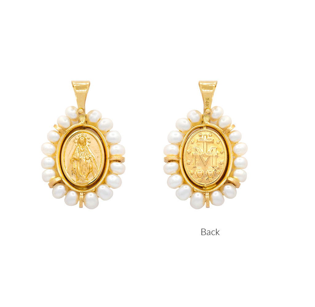 Gold pendants with pearl accents on a white background