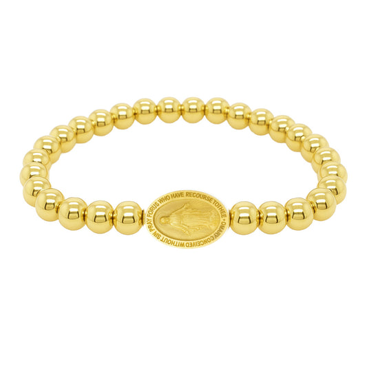 Gold beaded bracelet with a central medallion on a white background