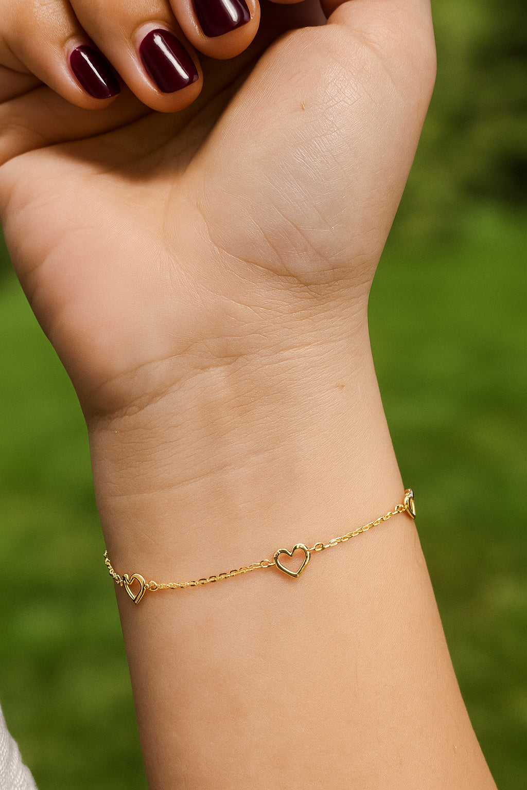 Curved Multiple Open Hearts Bracelet