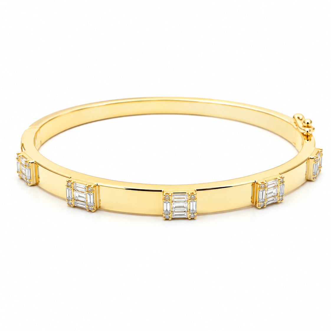 A 14k gold bangle bracelet featuring a series of baguette-cut and round cut diamond stones set in gold at regular intervals, shown on a clean white background.