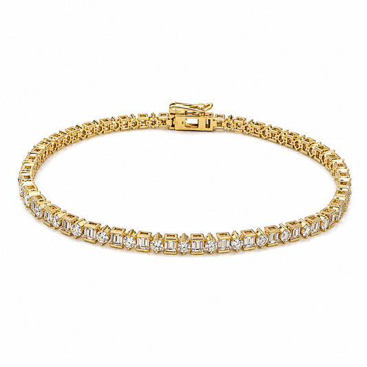 A 14K yellow gold tennis bracelet featuring baguette-cut and round cut natural diamond gemstones in a continuous row, displayed on a clean white background.
