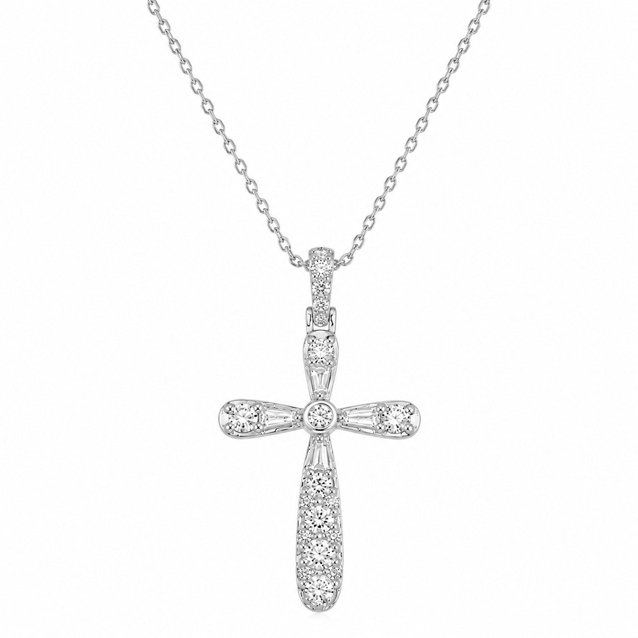 A white gold cross pendant necklace paved with small clear stones, hanging from a delicate white gold chain against a plain white background.