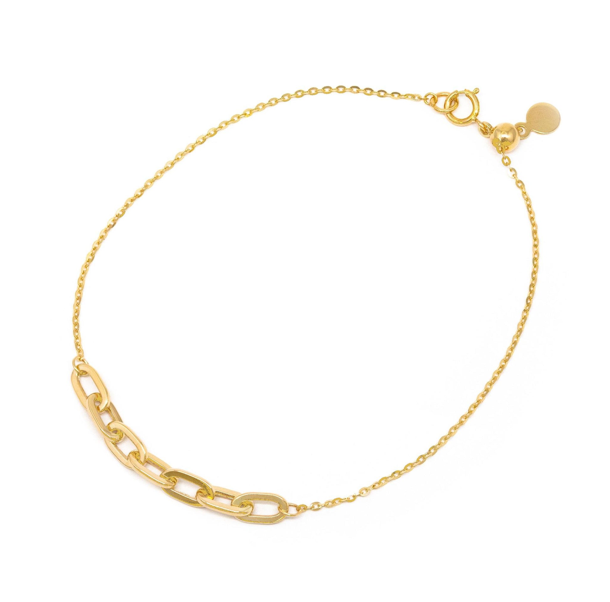 An adjustable 14 karat yellow gold paperclip bracelet with a spring ring bolo clasp, displayed on a white background.