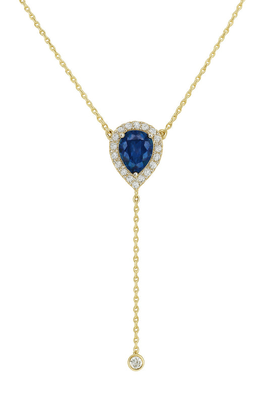 Gold necklace with a blue gemstone pendant on a white background