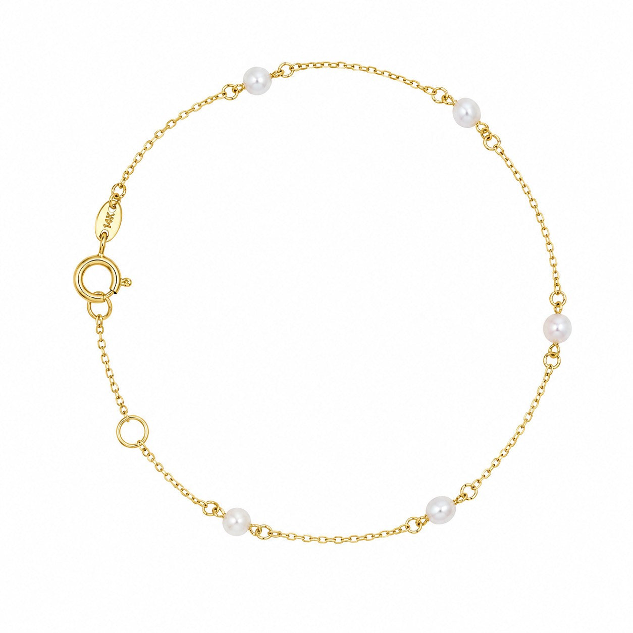 Gold bracelet with pearls on a white background
