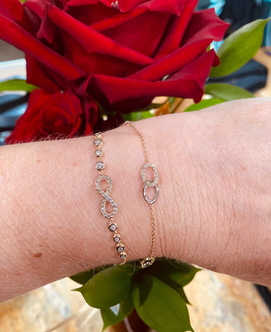 Endless Harmony: 14K Two-Tone Gold Interlocking Diamond Infinity Bracelet
