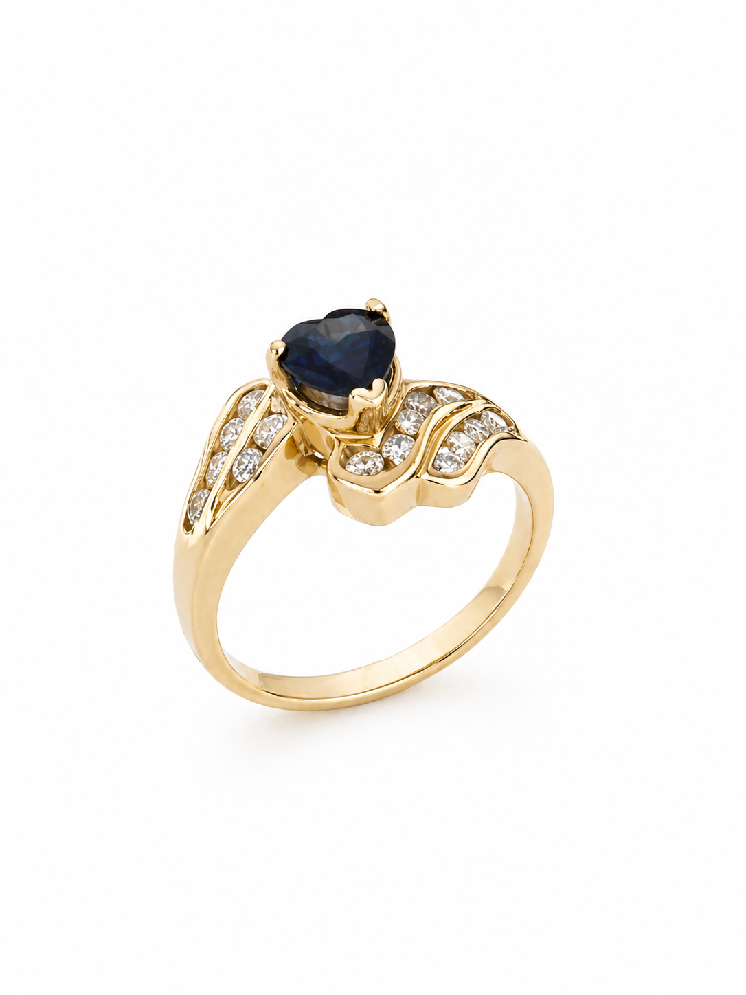 Gold ring with a heart-shaped blue sapphire gemstone and diamond accents on a white background