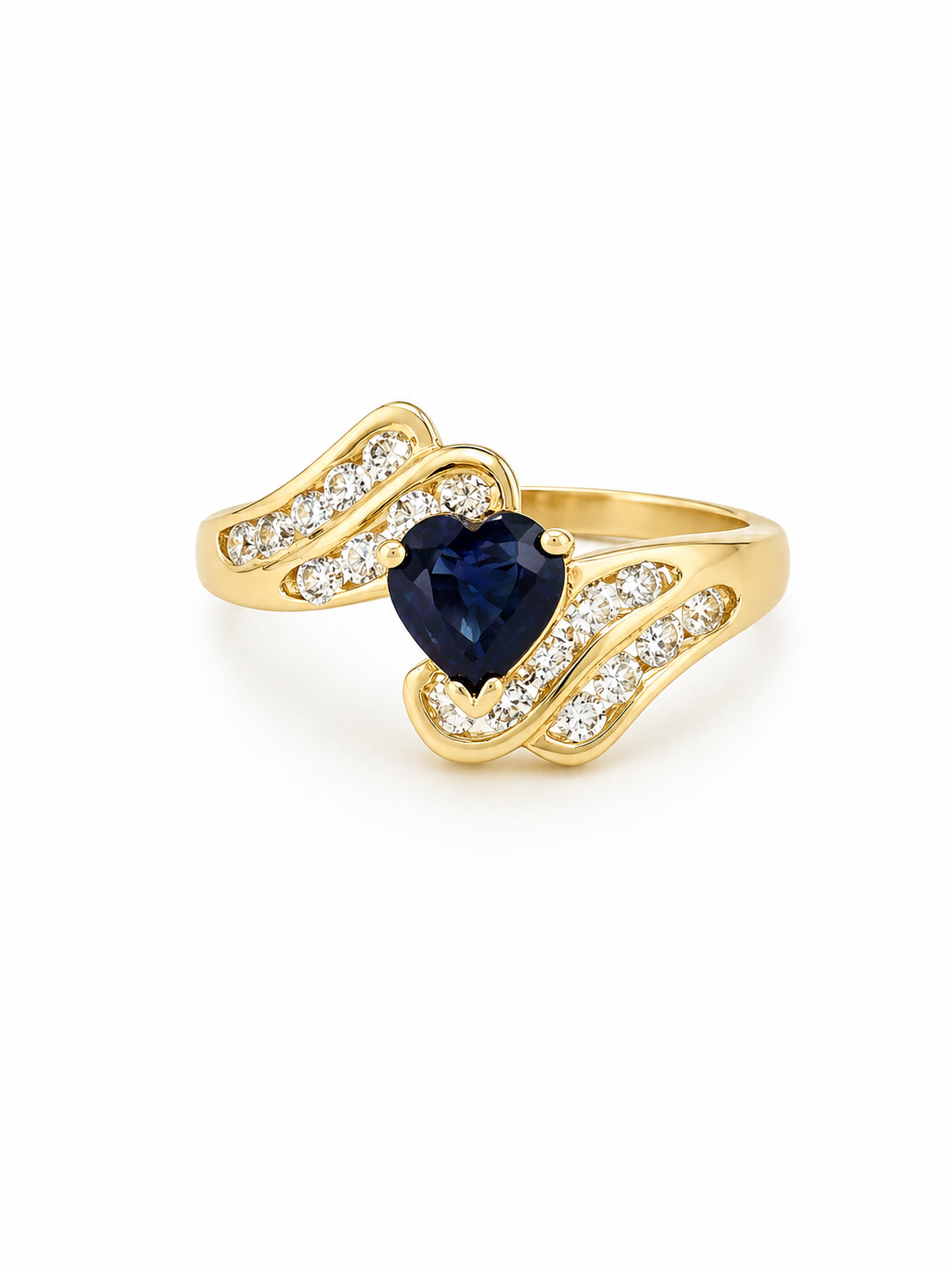 14K yellow Gold ring with a heart-shaped blue sapphire gemstone with diamonds on a white background