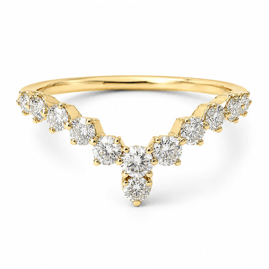 Gold ring with diamonds on a white background
