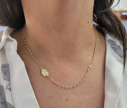 Rosary Necklace on a woman's Neck