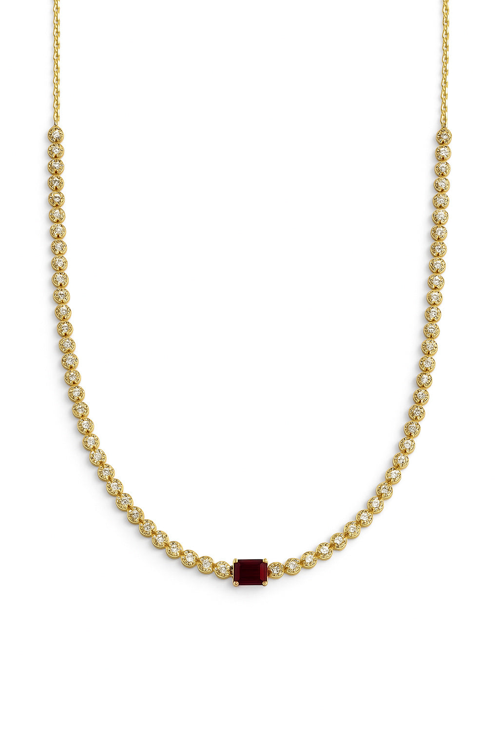 Gold necklace with a red ruby gemstone and diamonds on a white background