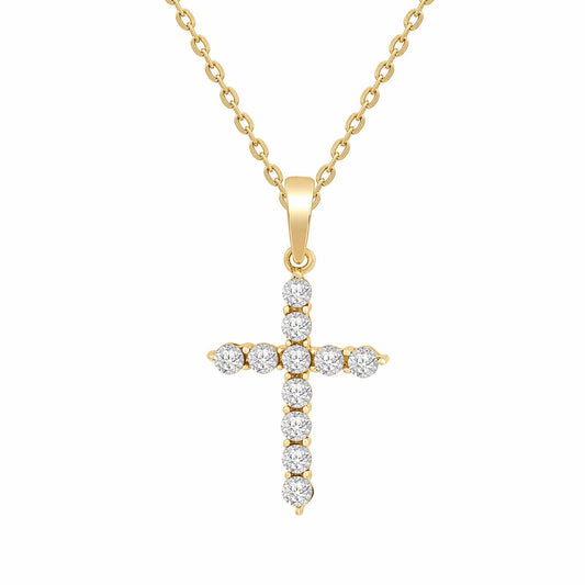 Small Gold diamond cross pendant necklace on a white background