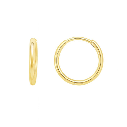 A pair of thin huggie hoop earrings made of 14K yellow gold.