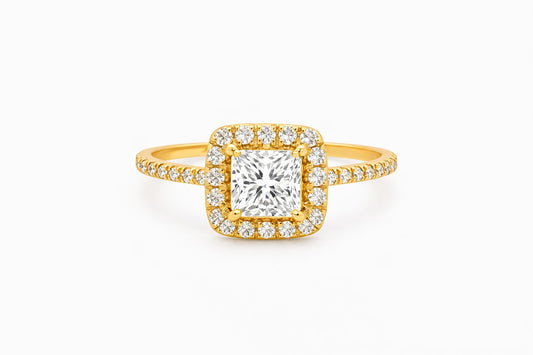 Yellow Gold Engagement ring with square Halo French Pave diamond on a white background