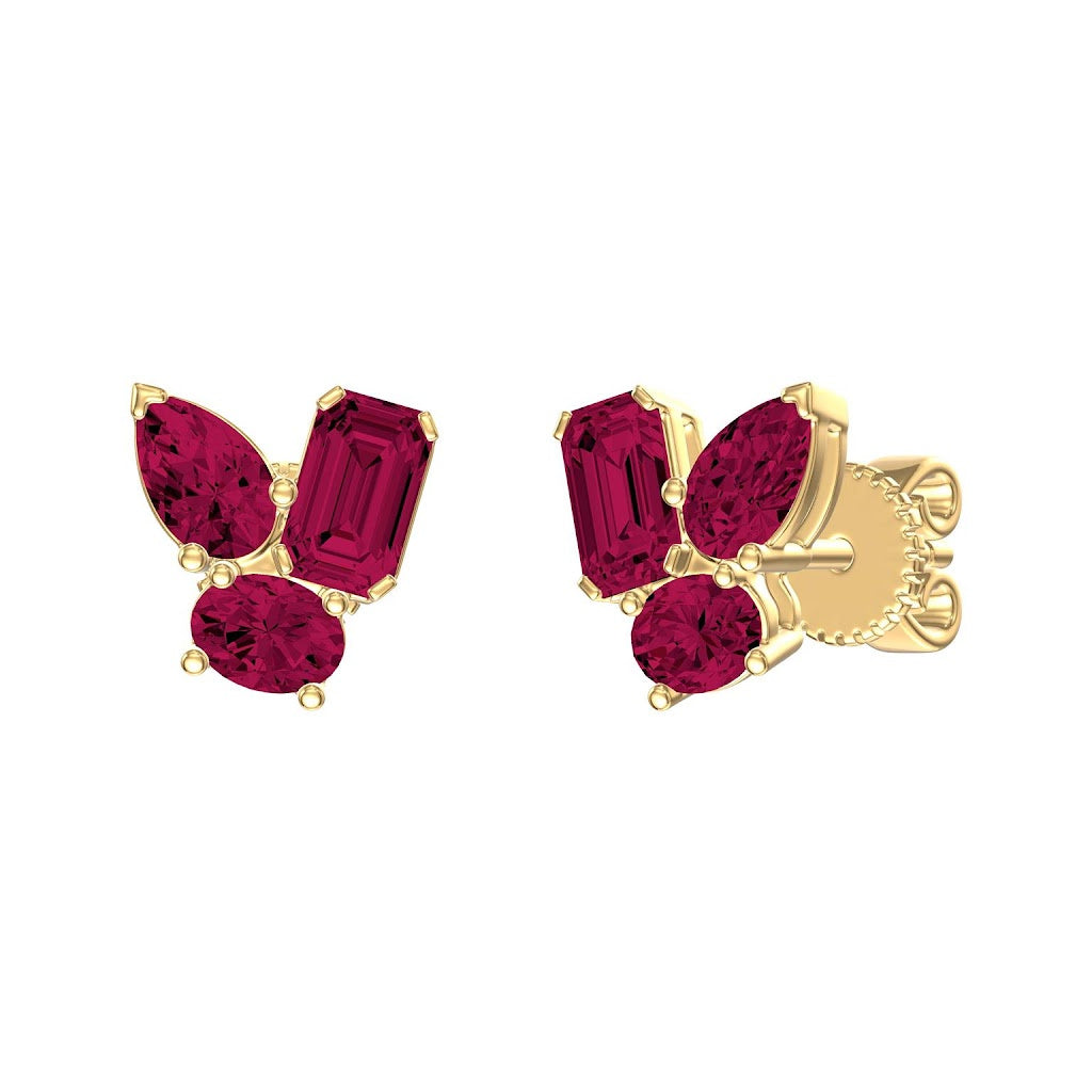 14K Gold earrings with red ruby gemstones on a white background