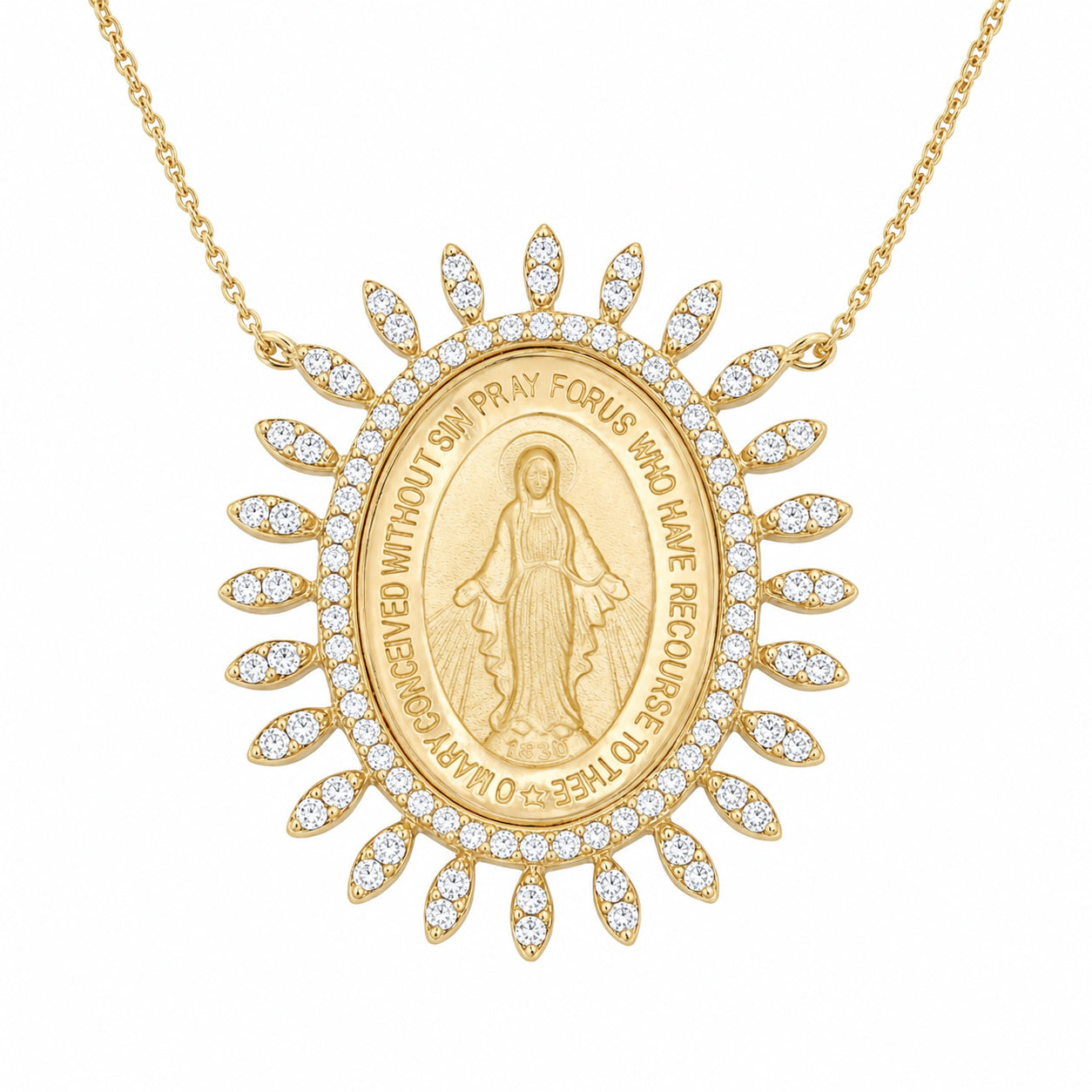 A gold Miraculous Medal pendant necklace on a delicate gold chain, featuring a central oval medal with a depiction of the Virgin Mary and surrounding text, bordered by small pave set diamond stones in a sunburst design, set against a plain white background.