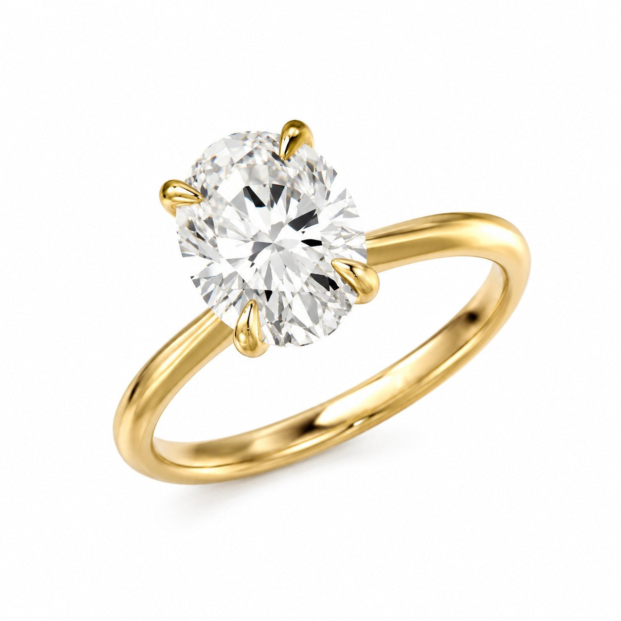 A yellow gold solitaire engagement ring featuring an oval-cut lab grown diamond gemstone in a four-prong setting, shown on a clean white background.